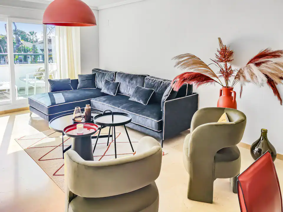 Bright living room with designer furnishings in a managed villa