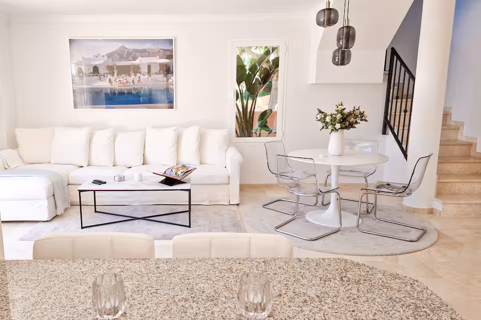 Master bedroom with garden views in a managed Marbella villa
